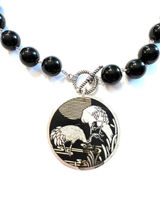 Storks in Water Tin Necklace