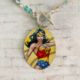 Wonder Woman with Scratches in Action Tin Necklace