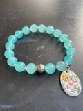Aqua Glass Bead with Silver Bead and Floral Tin Charm Bracelet