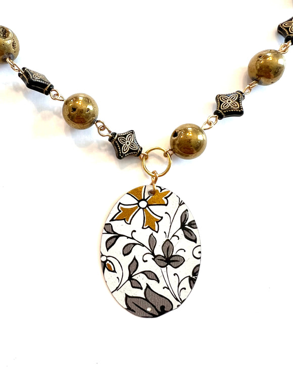 Grey and Gold Filigree Oval Tin Necklace